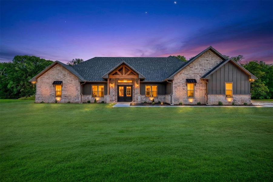 Front exterior of a new home in , Blossom, TX, highlighting curb appeal (Image 23). Front exterior of a new home in , Blossom, TX, highlighting curb appeal (Image 23).