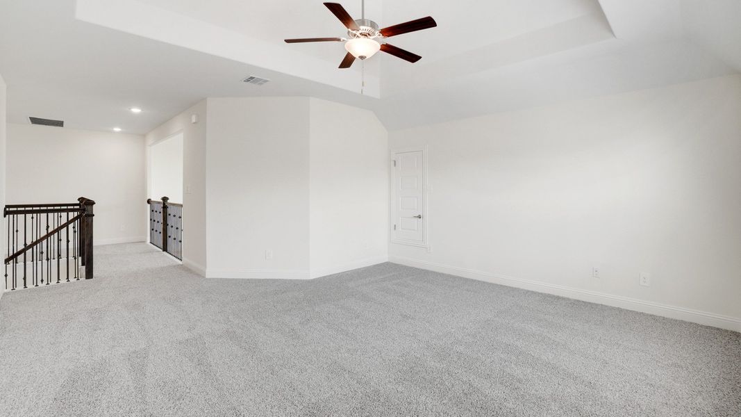 Representative furnished interior of a home built from the Dartmouth by DRB Homes in Creekhaven, Iowa Colony (Image 15).