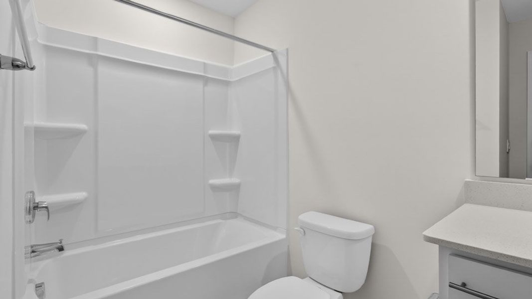 Furnished interior view inside a new home in Gretchen Pines, West End (Image 8).