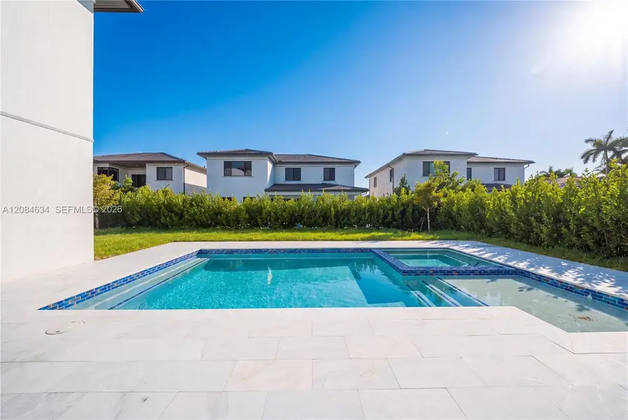 Exterior details and patio area of a home in , Miami (Image 3).