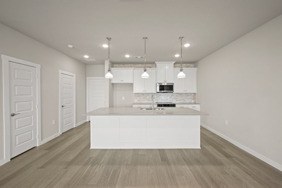 Furnished interior view inside a new home in Wildridge, Oak Point (Image 5).