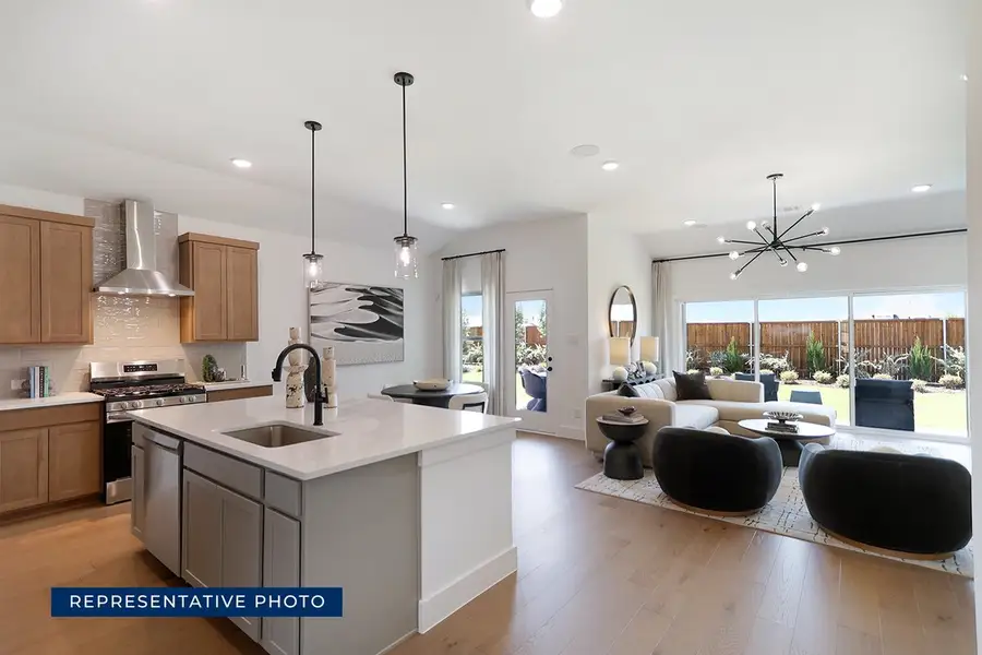 Representative furnished interior of a home built from the McKinley F by First Texas Homes in The Meadows, Denton (Image 6).