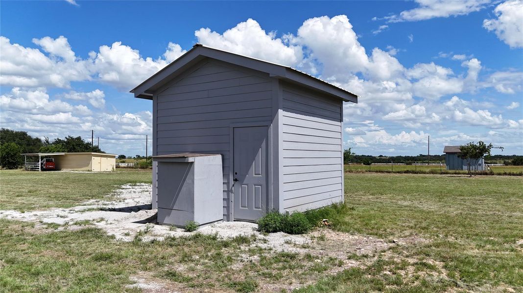 Well House with Storage Shed behind