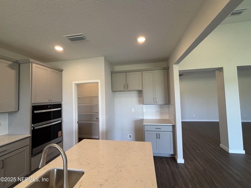 Furnished interior view inside a new home in The Cypress Series at Reserve East, Flagler Beach (Image 7).