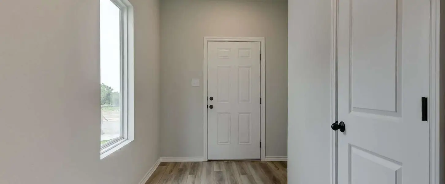 Representative unfurnished interior of a home built from the Travis by Ashton Woods in Hennersby Hollow, San Antonio (Image 11). Representative unfurnished interior of a home built from the Travis by Ashton Woods in Hennersby Hollow, San Antonio (Image 11).