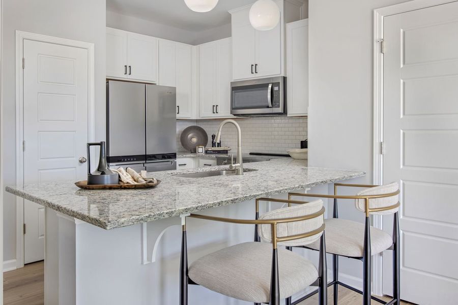 Representative furnished interior of a home built from the 1359 Modeled by KB Home in Brooks Mill - Edge Series, Durham (Image 5). Representative furnished interior of a home built from the 1359 Modeled by KB Home in Brooks Mill - Edge Series, Durham (Image 5).