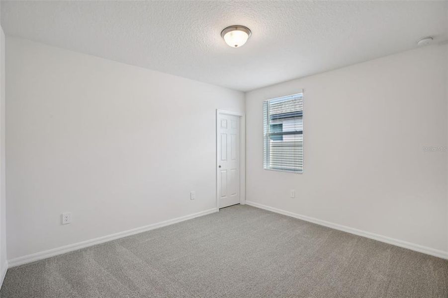 Spacious, unfurnished interior of a new home in Villamar - Signature Series, Winter Haven (Image 24).