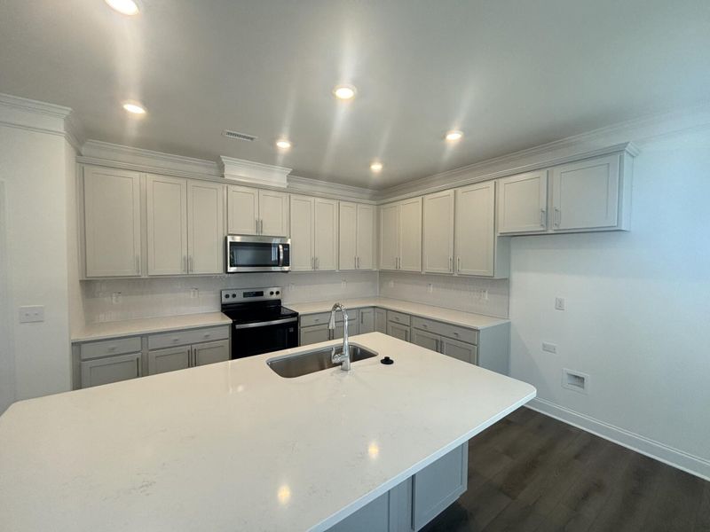 Furnished interior view inside a new home in Daniel Farms, Benson (Image 7).
