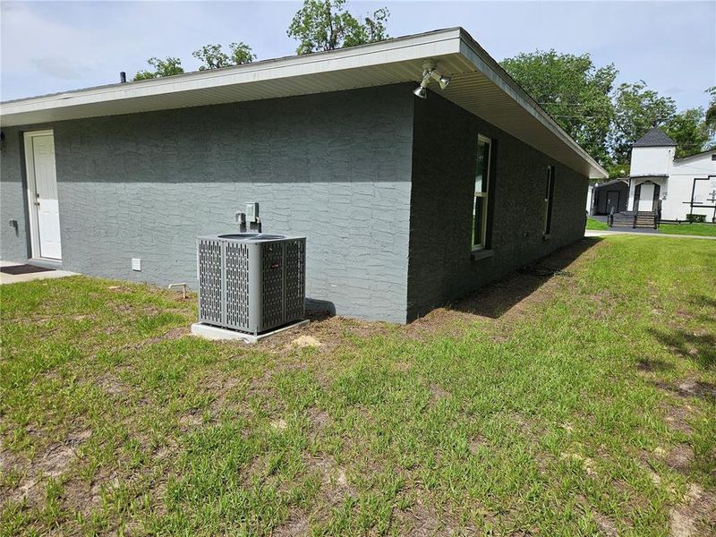 Exterior details and patio area of a home in , Williston (Image 18).