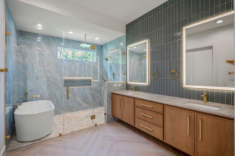Dream spa inspired primary bathroom creates a space you never want to leave. Dream spa inspired primary bathroom creates a space you never want to leave.