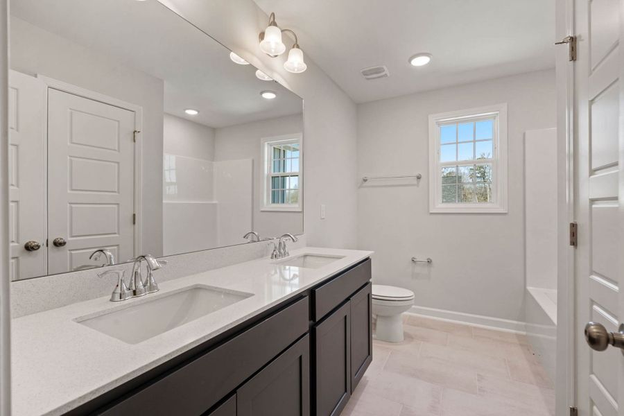 Representative furnished interior of a home built from the The Gavin II by JSJ Builders in Langdon Ridge, Angier (Image 8).