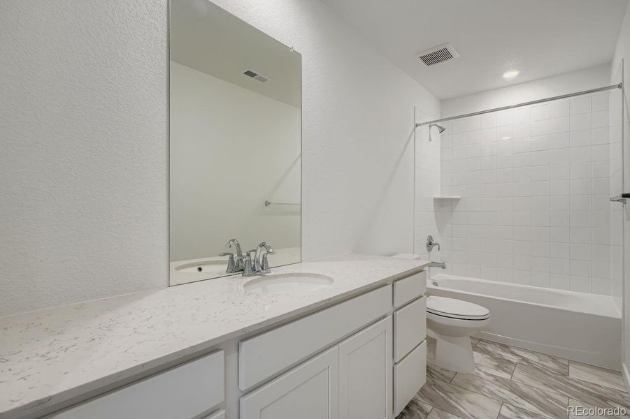 Furnished interior view inside a new home in Parterre: The Skyline Collection, Thornton (Image 9).