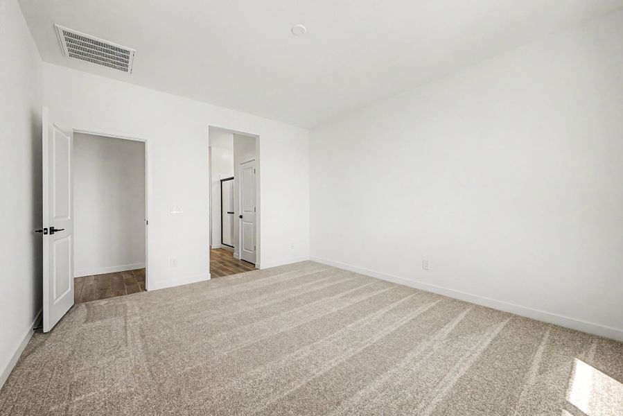 Spacious, unfurnished interior of a new home in The Villages at North Copper Canyon, Surprise (Image 11).