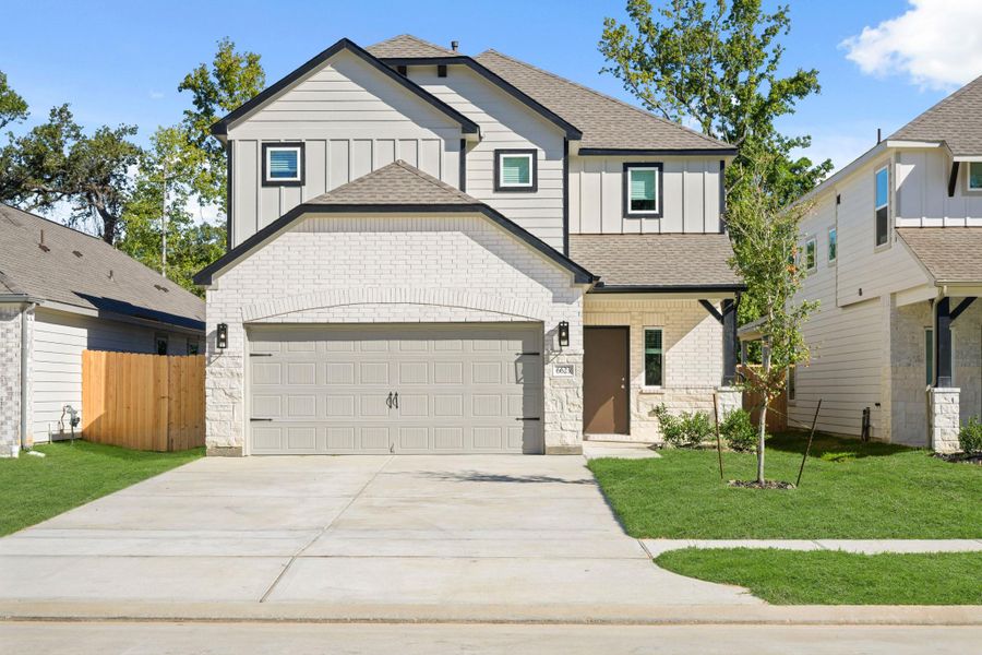 Front exterior of a new home in Cypresswood Landing, Humble, TX, highlighting curb appeal (Image 2). Front exterior of a new home in Cypresswood Landing, Humble, TX, highlighting curb appeal (Image 2).