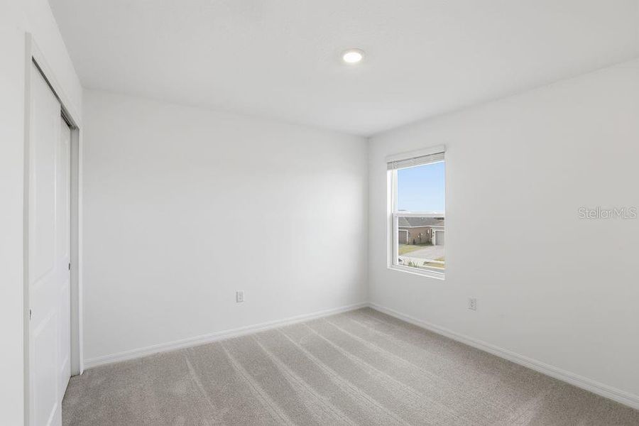 Spacious, unfurnished interior of a new home in Waterstone, Groveland (Image 35).