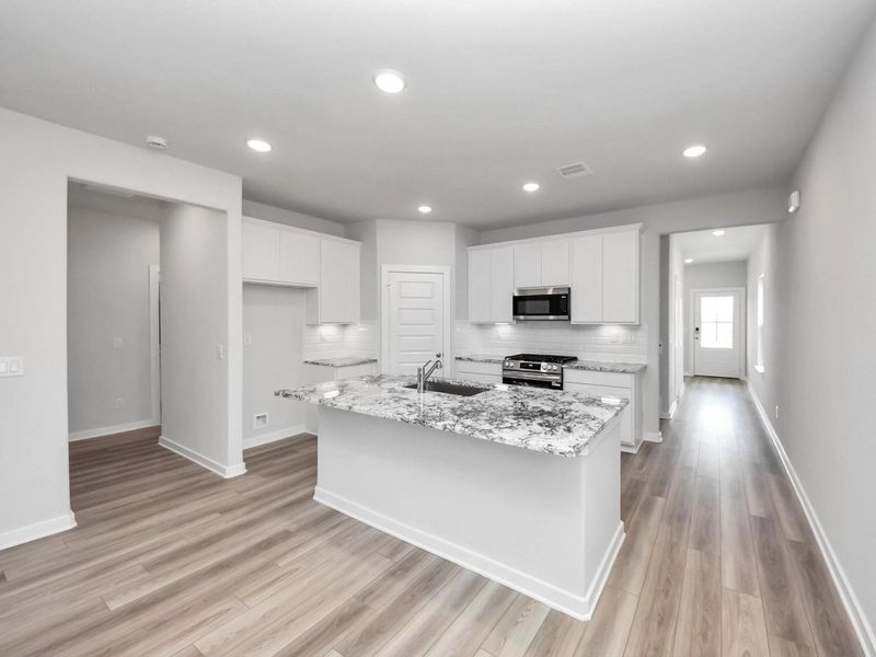 Furnished interior view inside a new home in Windmill Estates, Magnolia (Image 3).