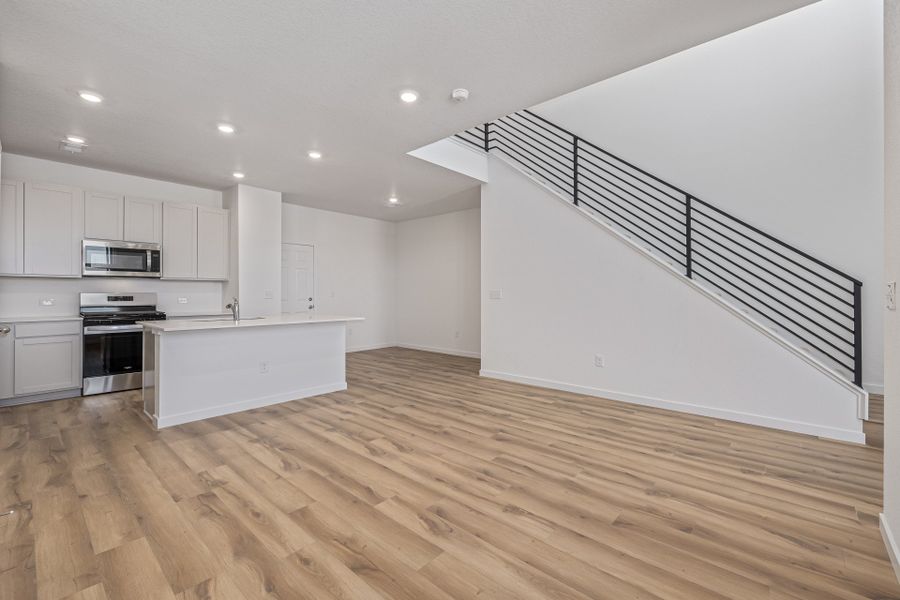 Furnished interior view inside a new home in Painted Prairie, Aurora (Image 6).