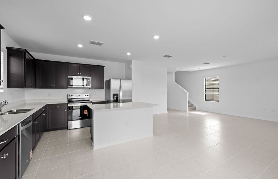 Furnished interior view inside a new home in Whispering Lakes, Lehigh Acres (Image 12).
