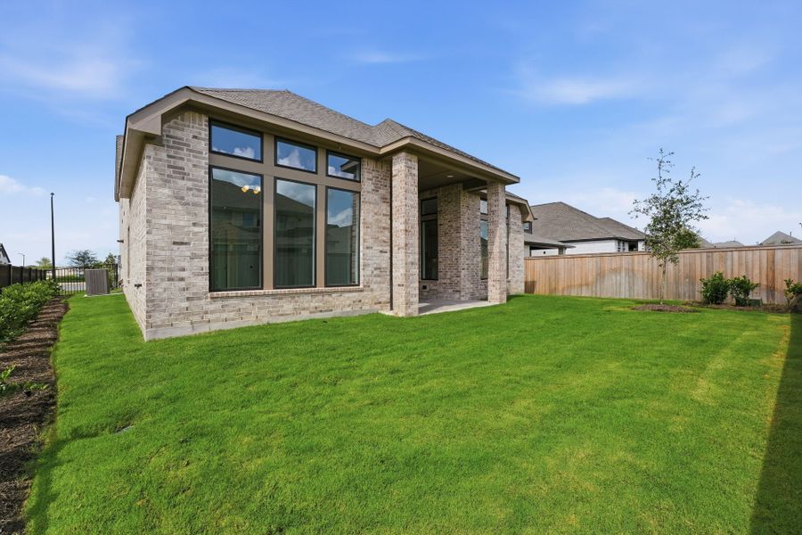 Exterior details and patio area of a home in Bridgeland 50′, Cypress (Image 22).