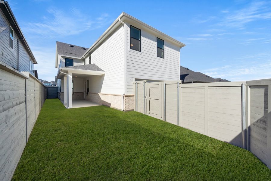 Exterior details and patio area of a home in Treeline, Justin (Image 3). Exterior details and patio area of a home in Treeline, Justin (Image 3).