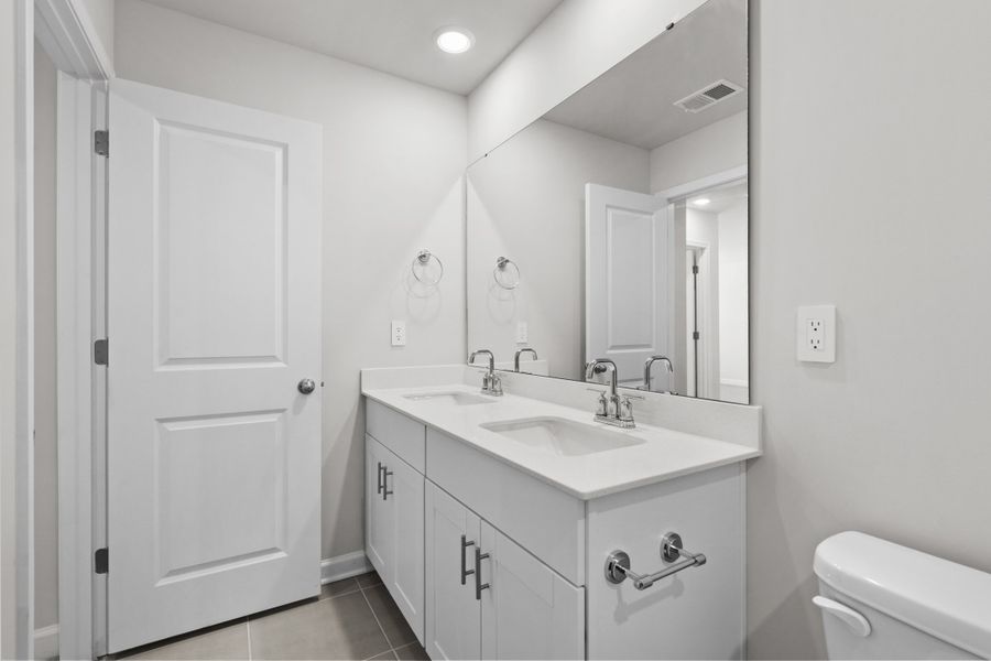 Furnished interior view inside a new home in Waterside - Coastline Series, Longs (Image 10).