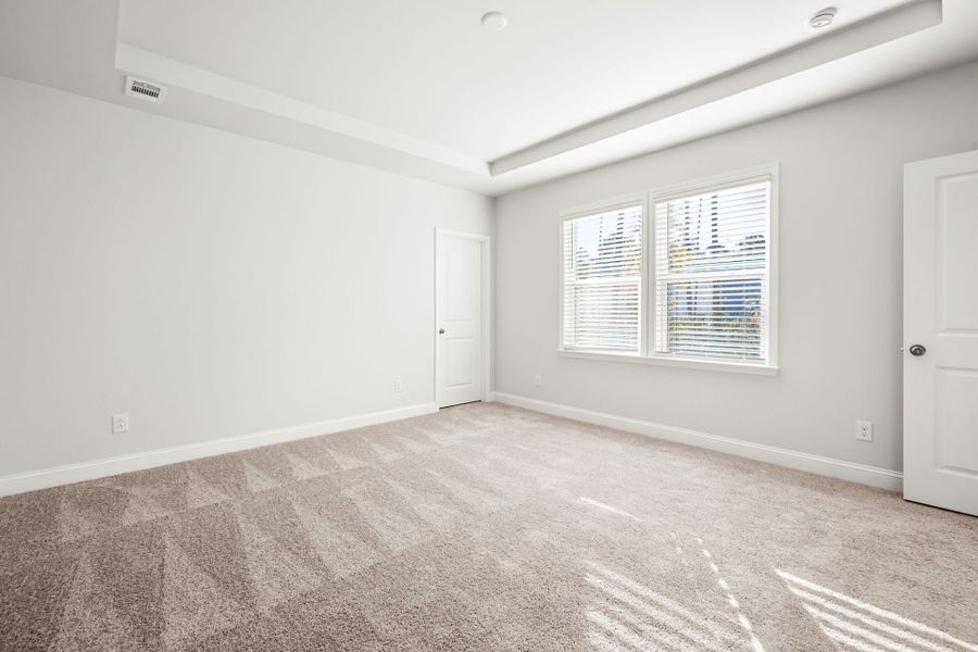Spacious, unfurnished interior of a new home in Waterways, Richmond Hill (Image 21).