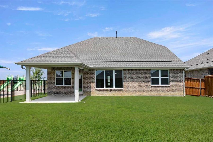Exterior details and patio area of a home in Brookshire at Legacy Hills-60s, Celina (Image 23).