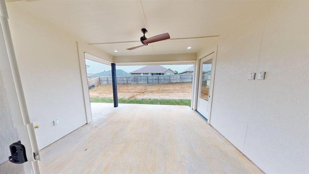 View of patio with ceiling fan
