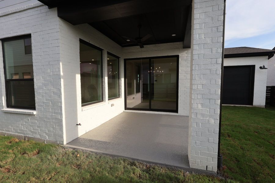 Exterior details and patio area of a home in Easthaven at Bridgeland Central - Vision Collection, Cypress (Image 4). Exterior details and patio area of a home in Easthaven at Bridgeland Central - Vision Collection, Cypress (Image 4).