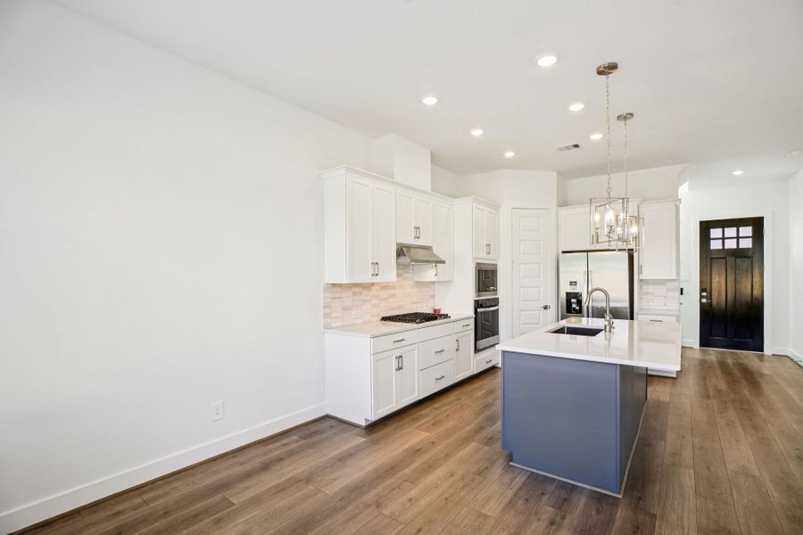 Furnished interior view inside a new home in Pinewood Trails - Luxe Series, Houston (Image 12).