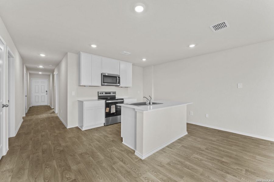 Furnished interior view inside a new home in Swenson Heights, Seguin (Image 6).