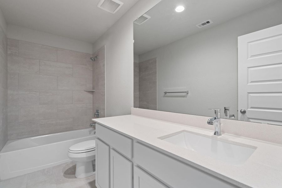 Furnished interior view inside a new home in Grand Oaks Village, Houston (Image 4). Furnished interior view inside a new home in Grand Oaks Village, Houston (Image 4).