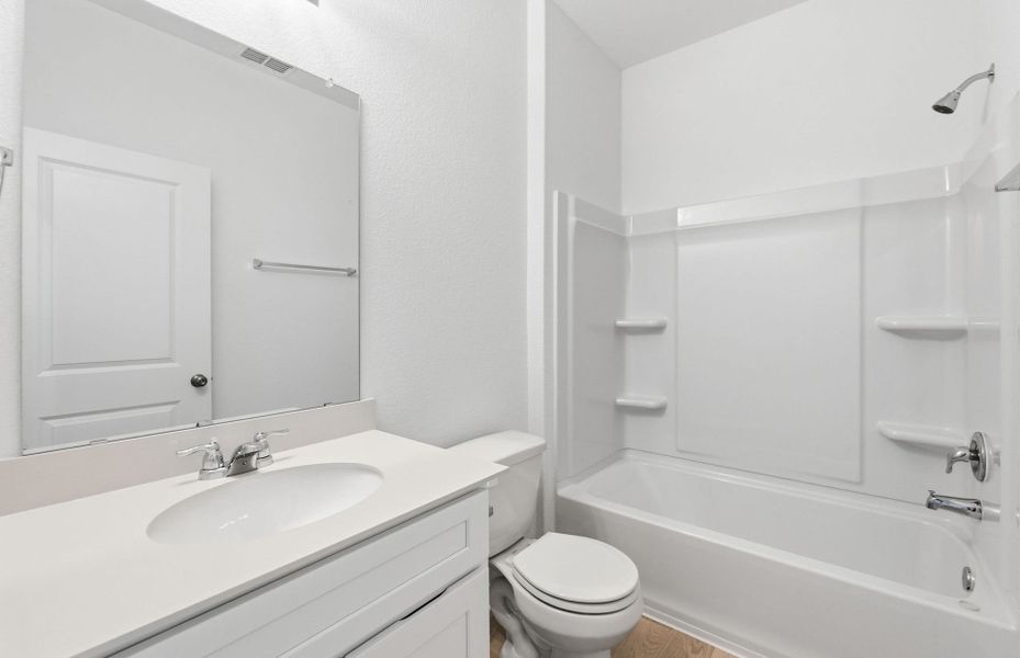 Furnished interior view inside a new home in Sunfield, Buda (Image 11).