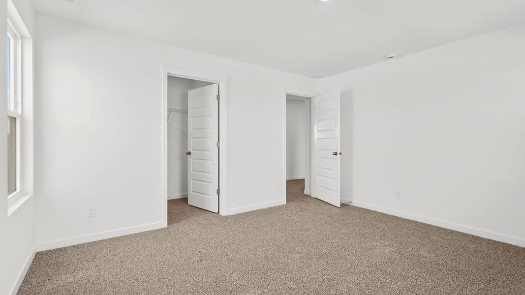 Representative unfurnished interior of a home built from the Holcombe by D.R. Horton in Peachtree Meadows, Rockwall (Image 42).