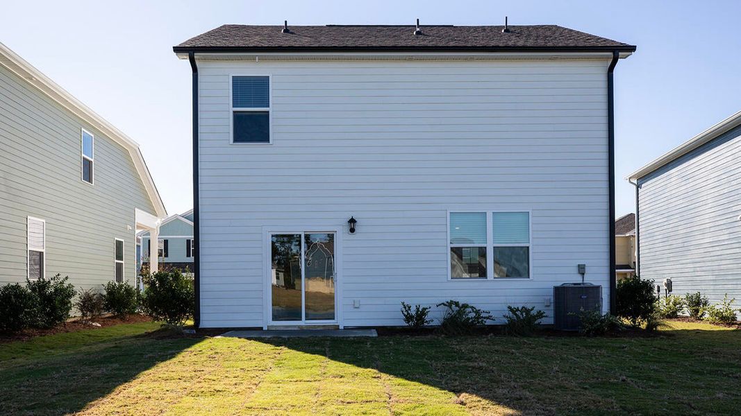 Exterior details and patio area of a home in Indigo Preserve, Leland (Image 2).
