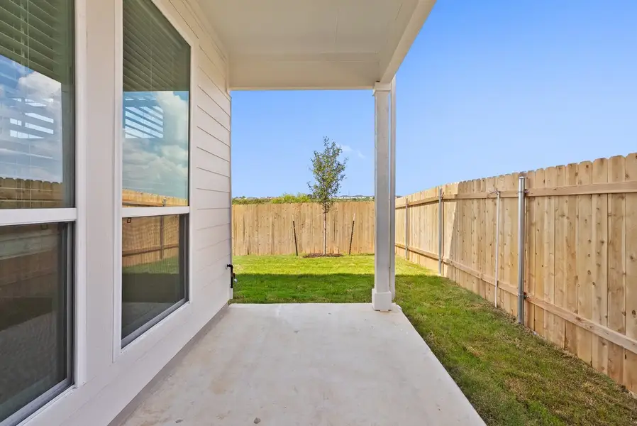 Exterior details and patio area of a home in Porter Country, Buda (Image 3).