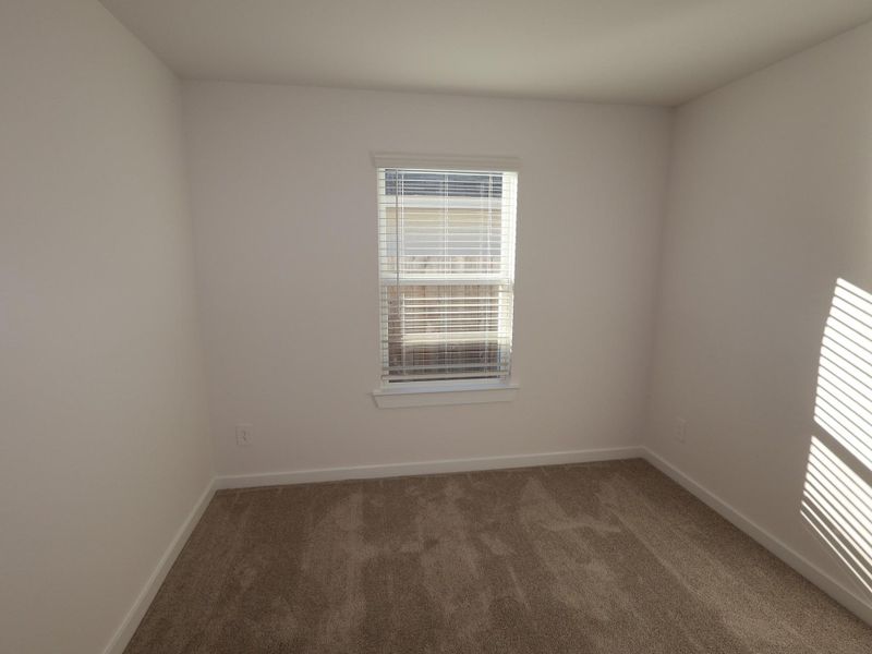 Spacious, unfurnished interior of a new home in Pinewood at Grand Texas, New Caney (Image 13).