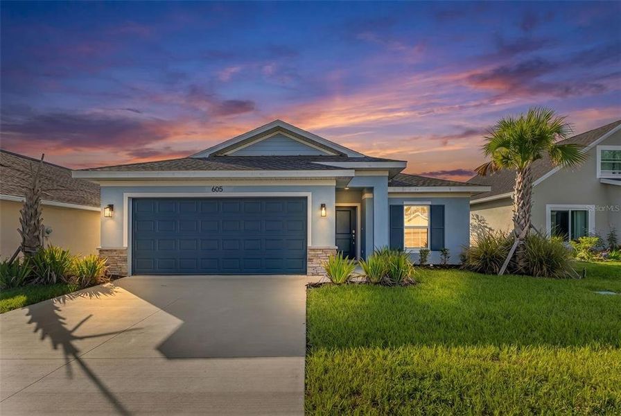 Front exterior of a new home in , Port Charlotte, FL, highlighting curb appeal (Image 20).
