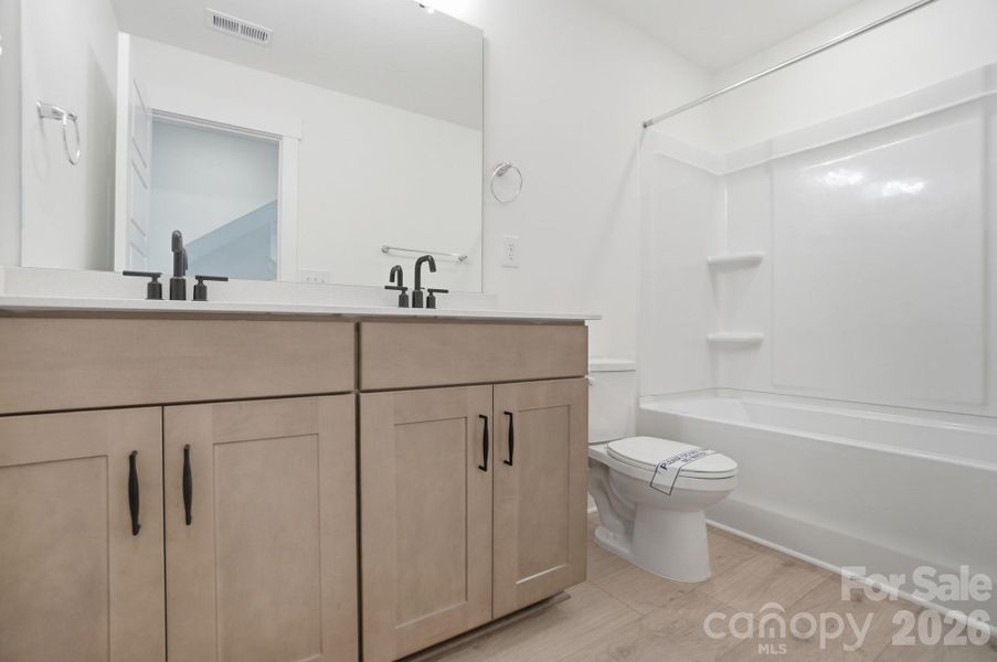 Furnished interior view inside a new home in Chasewood, Mint Hill (Image 9).