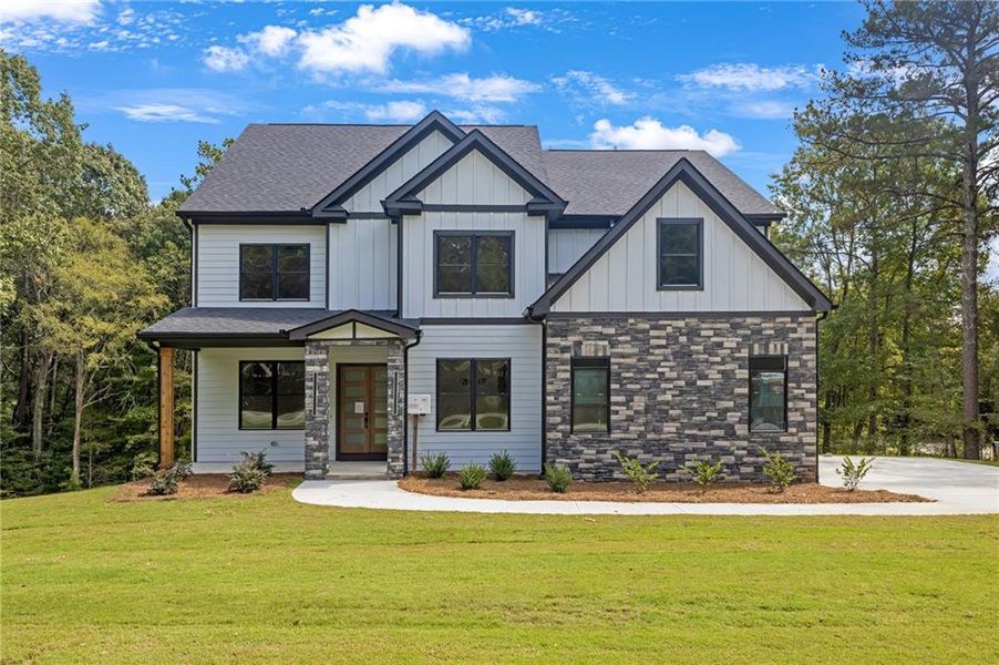 Front exterior of a new home in , Conyers, GA, highlighting curb appeal (Image 13).