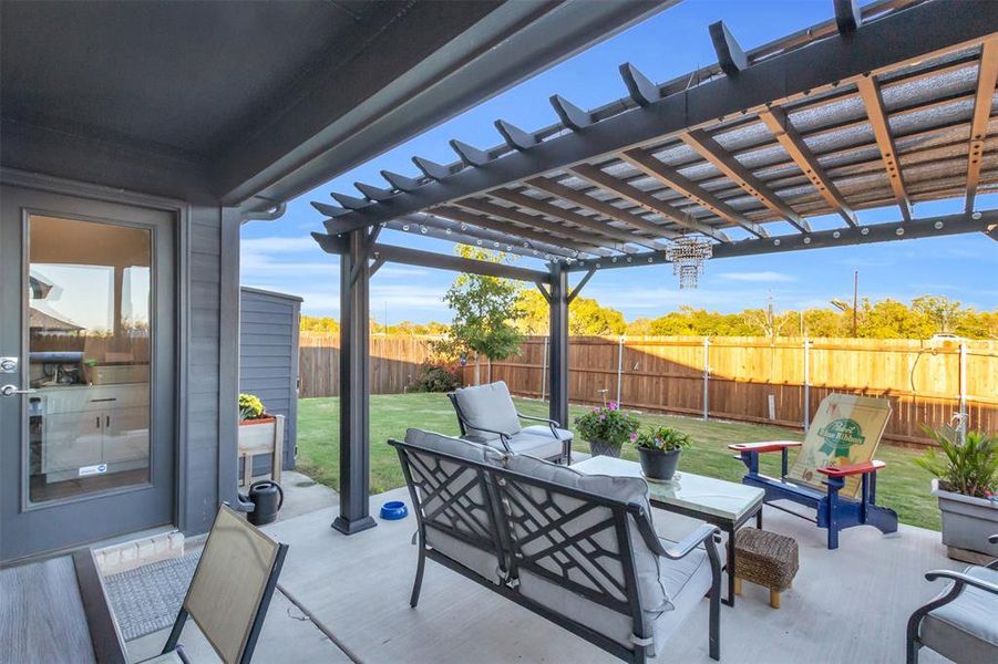 View of patio with a pergola and an outdoor living space