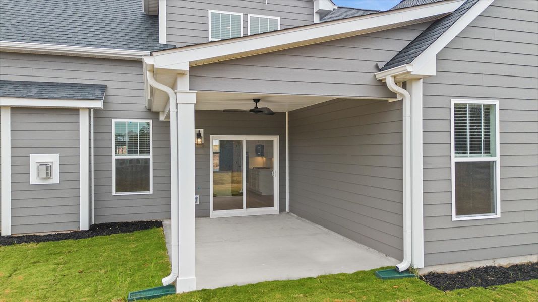 Vibrant rear outdoor space featuring a covered porch and exceptional craftsmanship Vibrant rear outdoor space featuring a covered porch and exceptional craftsmanship