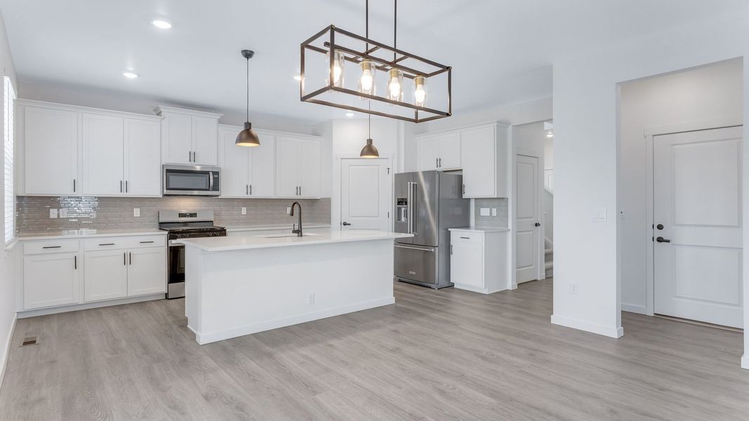 Representative furnished interior of a home built from the Calhan by D.R. Horton in Vantage, Berthoud (Image 7).