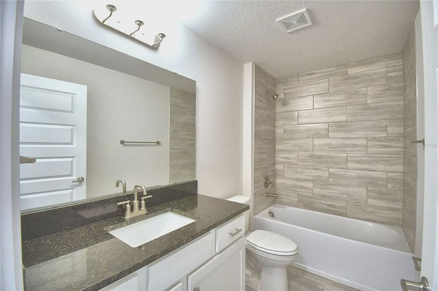 Furnished interior view inside a new home in Lake Juliana Estates, Auburndale (Image 8).