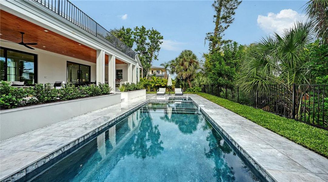 Exterior details and patio area of a home in , Sarasota (Image 25).