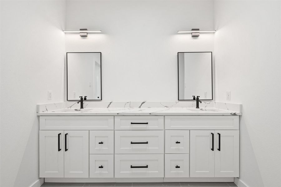 Full bathroom featuring double vanity Full bathroom featuring double vanity