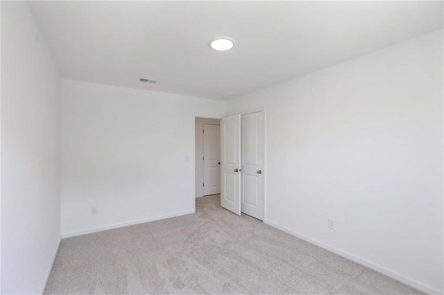 Spacious, unfurnished interior of a new home in The Pointe at Heron Bay, Locust Grove (Image 28).