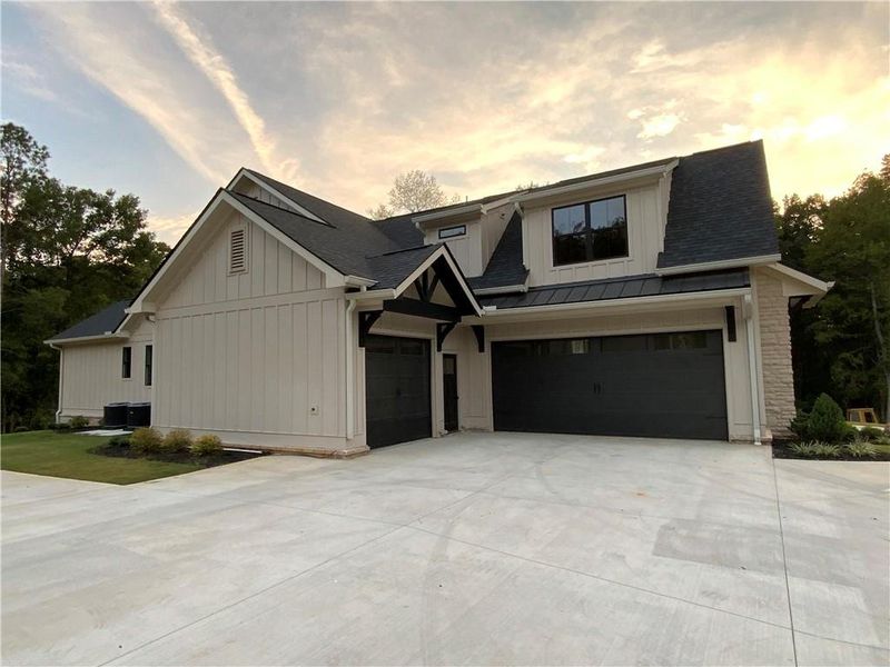 Front exterior of a new home in , Conyers, GA, highlighting curb appeal (Image 12). Front exterior of a new home in , Conyers, GA, highlighting curb appeal (Image 12).