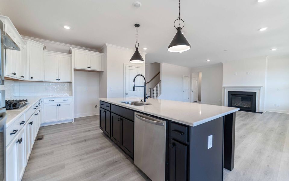 Furnished interior view inside a new home in Aden Woods, Fairview (Image 6).