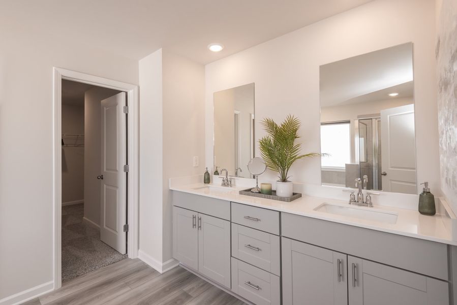 The primary suite includes dual sinks that make getting ready in the morning a breeze.